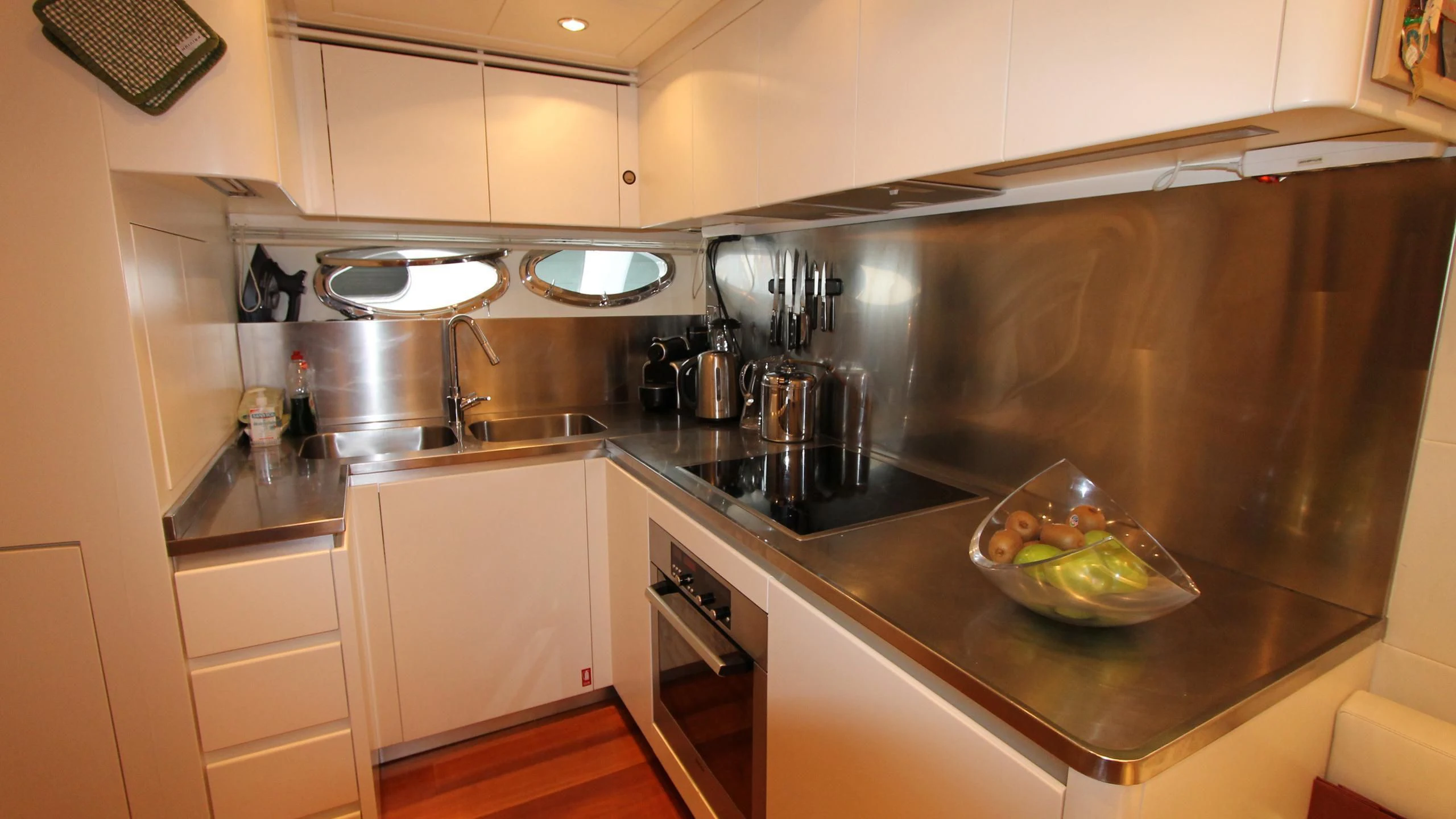 a kitchen with a large sink aboard A&O Yacht for Sale