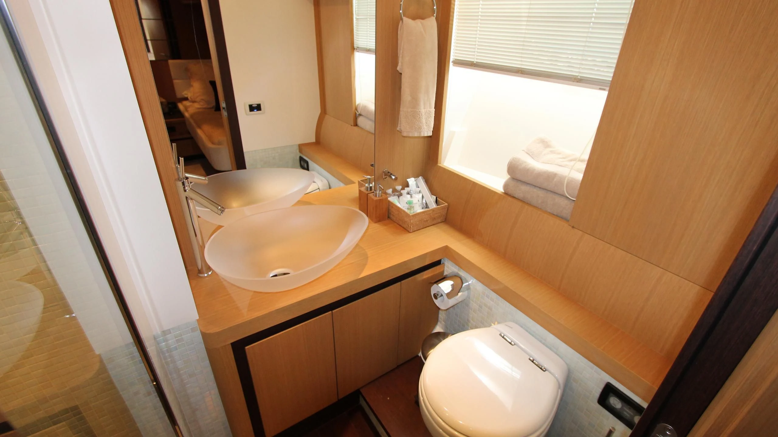 a bathroom with a sink and a toilet aboard A&O Yacht for Sale