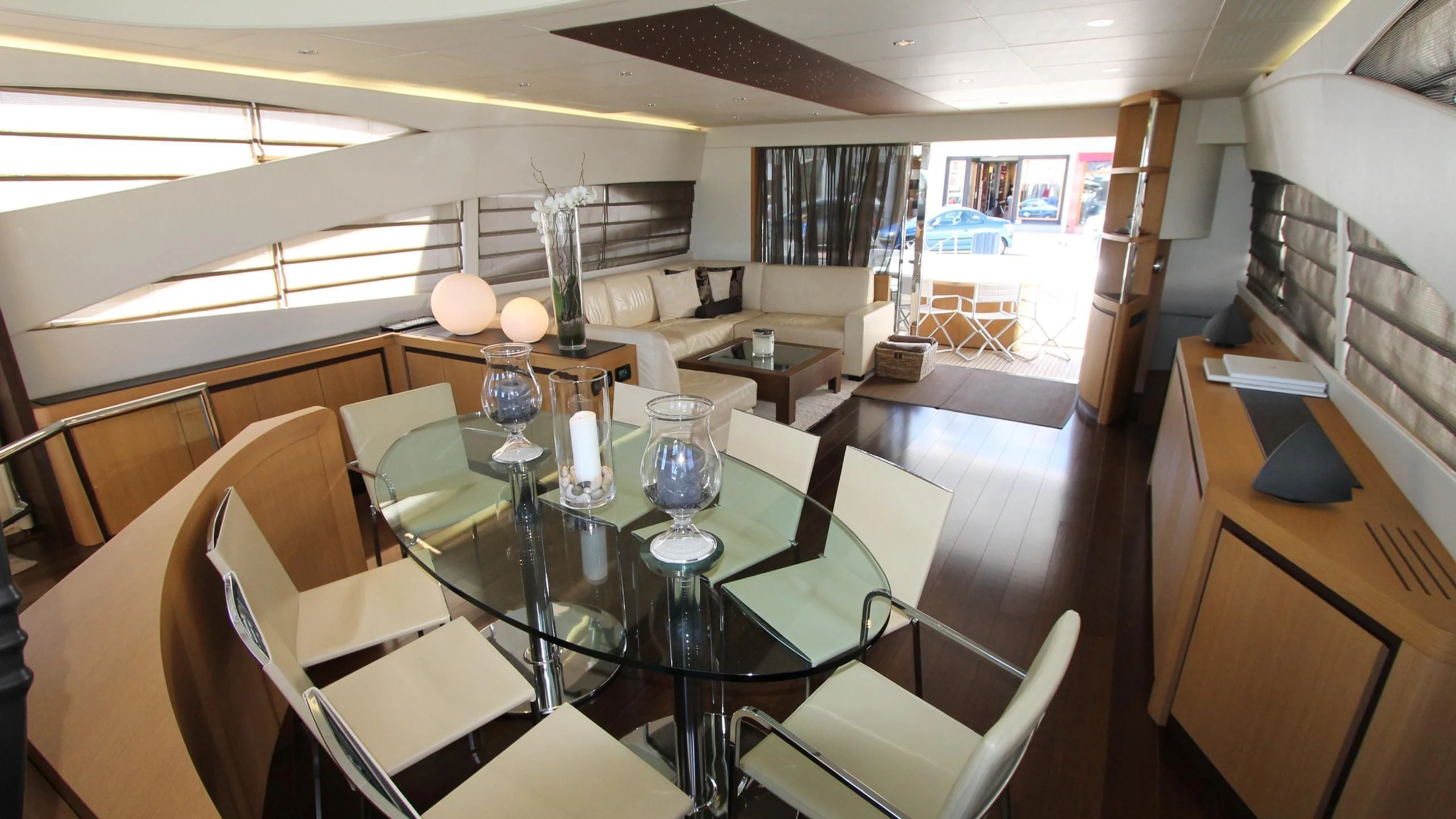 a dining room with a table and chairs aboard A&O Yacht for Sale