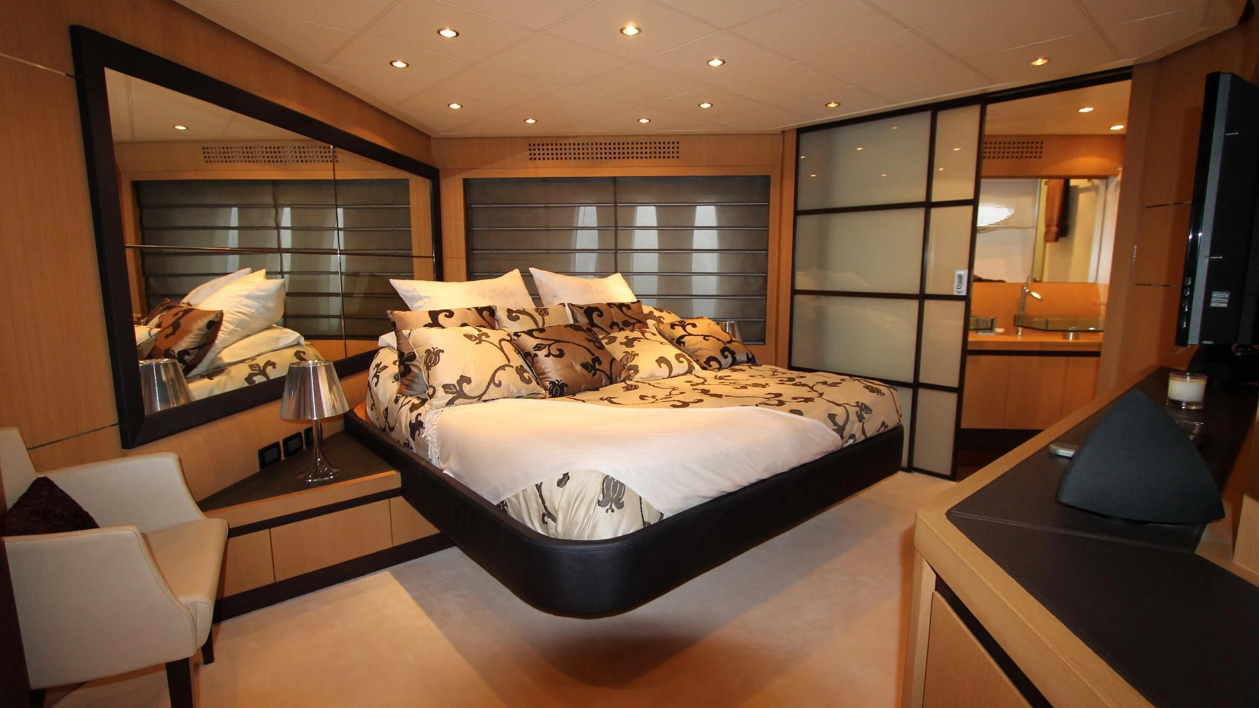 a bedroom with a large bed aboard A&O Yacht for Sale