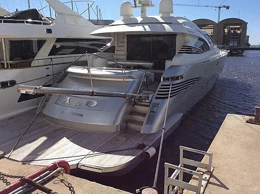 a boat docked at a pier aboard A&O Yacht for Sale