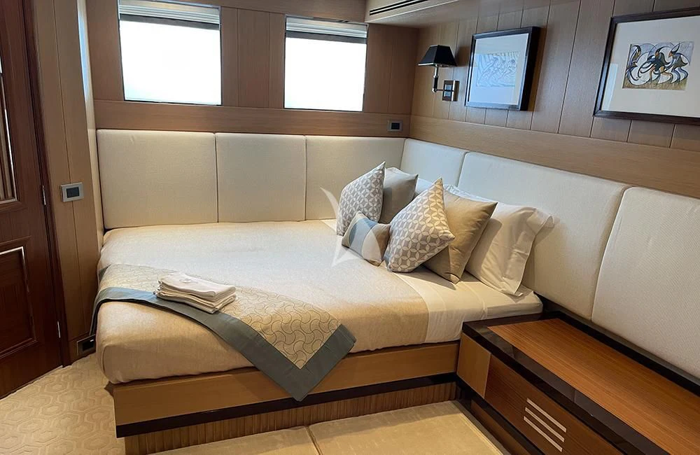 a bed with pillows aboard KATHLEEN ANNE Yacht for Sale