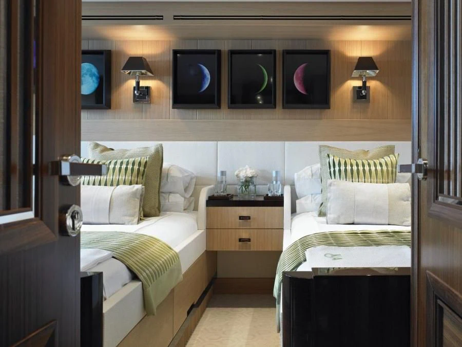 a room with a bed and a television aboard KATHLEEN ANNE Yacht for Sale