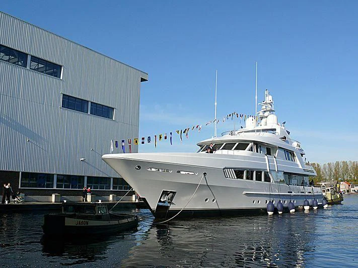 a boat docked at a pier aboard KATHLEEN ANNE Yacht for Sale