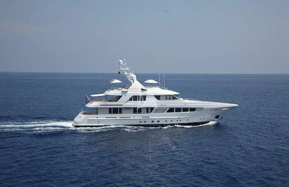 a white boat on the water aboard KATHLEEN ANNE Yacht for Sale