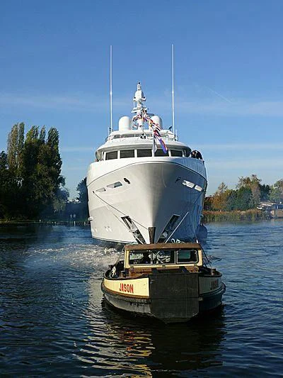 a large white boat in the water aboard KATHLEEN ANNE Yacht for Sale