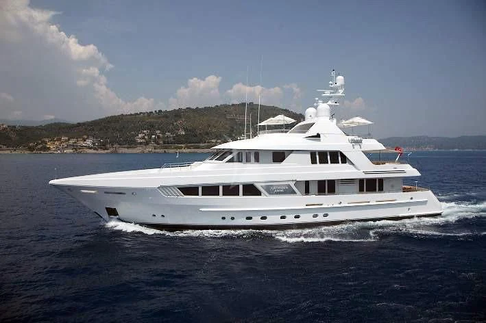 a white yacht on the water aboard KATHLEEN ANNE Yacht for Sale