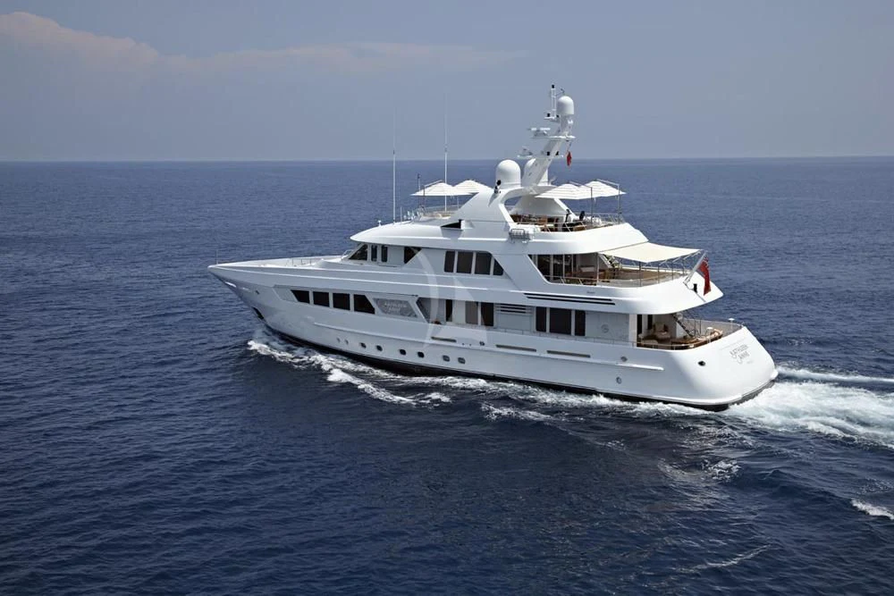 a white boat on the water aboard KATHLEEN ANNE Yacht for Sale