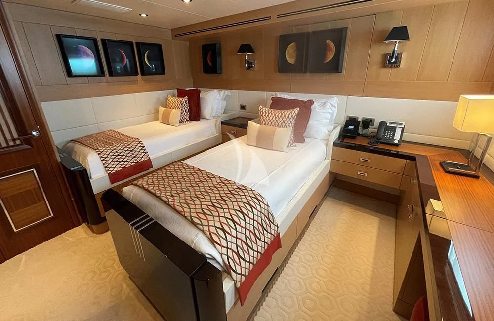 a hotel room with two beds aboard KATHLEEN ANNE Yacht for Sale