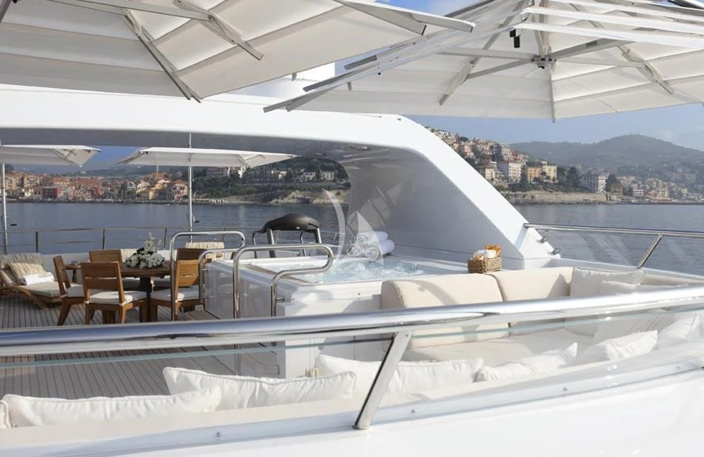 a boat with tables and chairs on it aboard KATHLEEN ANNE Yacht for Sale