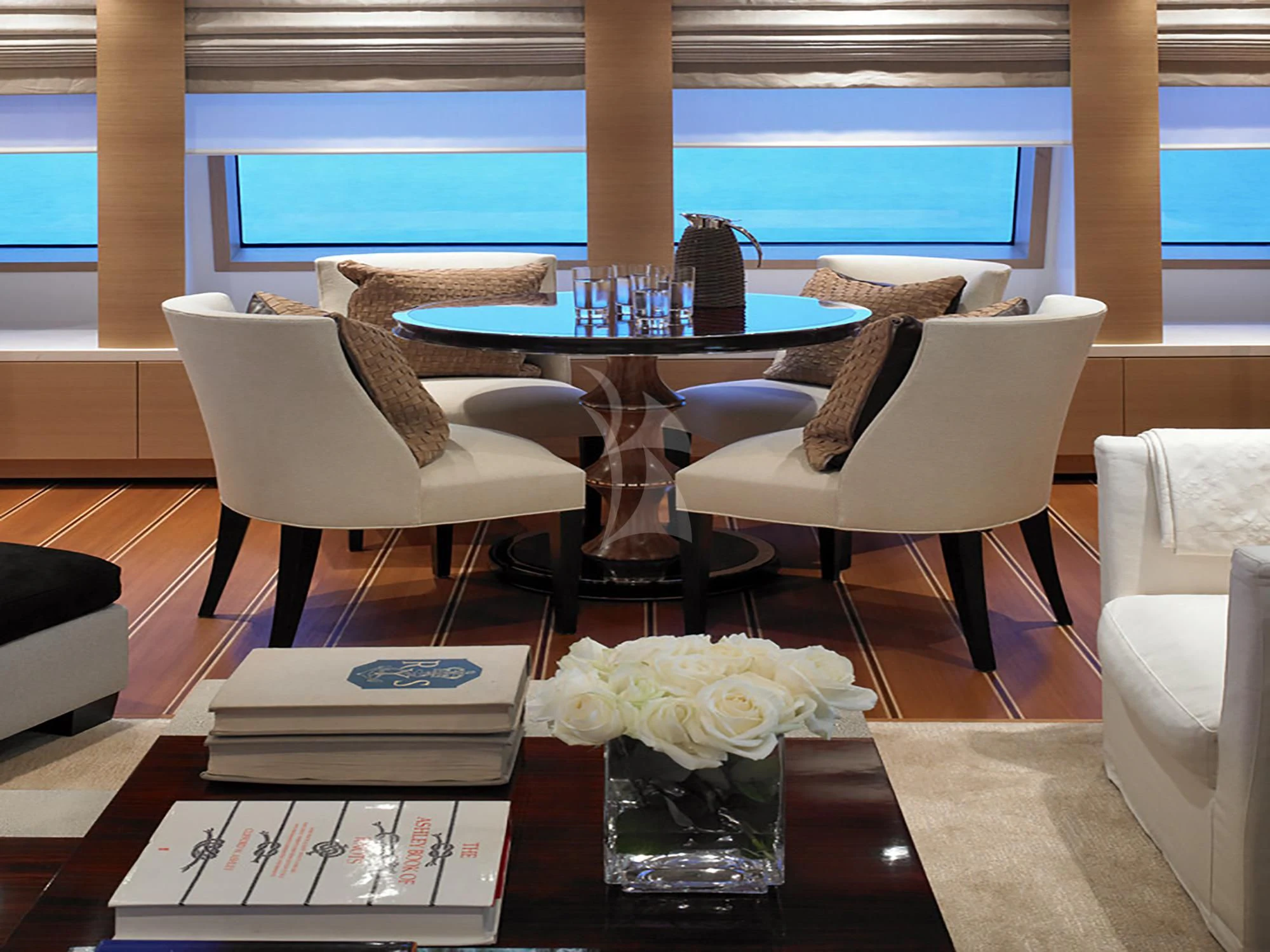 a room with a table and chairs aboard KATHLEEN ANNE Yacht for Sale