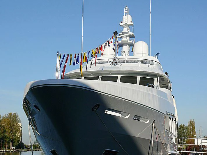 a large ship with flags on it aboard KATHLEEN ANNE Yacht for Sale