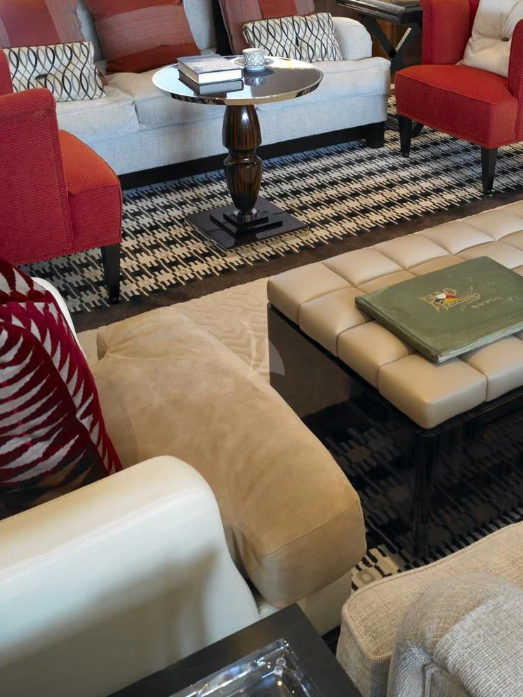 a living room with a table and chairs aboard KATHLEEN ANNE Yacht for Sale