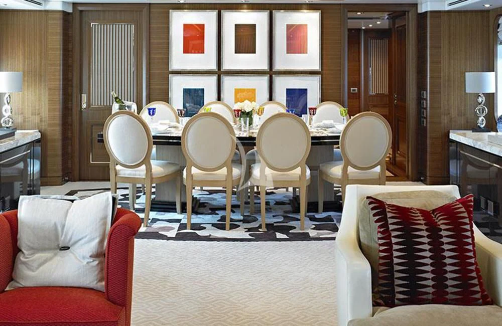 a living room with chairs and a table aboard KATHLEEN ANNE Yacht for Sale