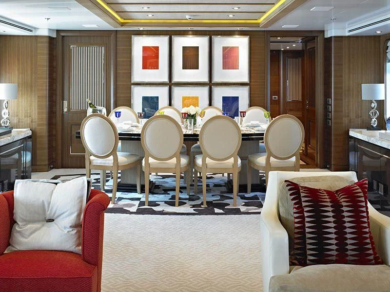 a living room with a dining table aboard KATHLEEN ANNE Yacht for Sale