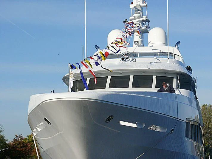 a boat with a person on the front aboard KATHLEEN ANNE Yacht for Sale