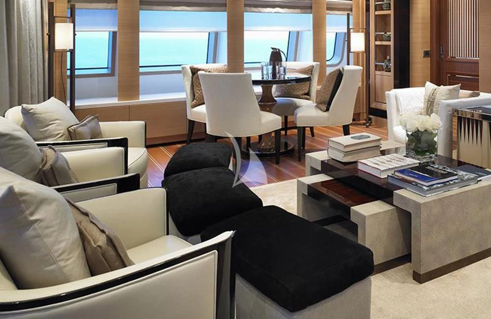 a living room with a couch and a table aboard KATHLEEN ANNE Yacht for Sale