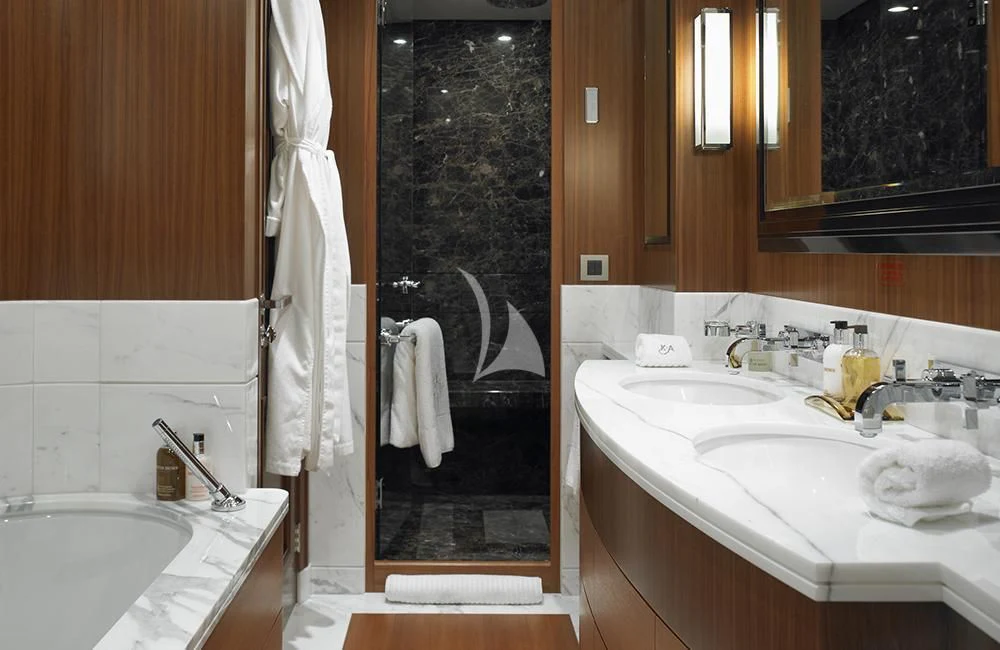 a bathroom with a large mirror aboard KATHLEEN ANNE Yacht for Sale
