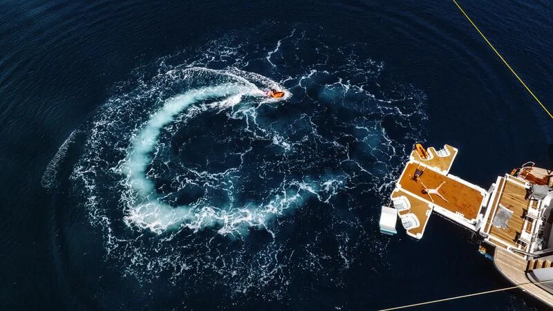 a satellite in space aboard AT ONE Yacht for Charter