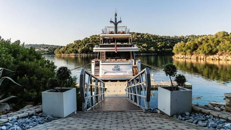 a boat on a body of water aboard AT ONE Yacht for Charter