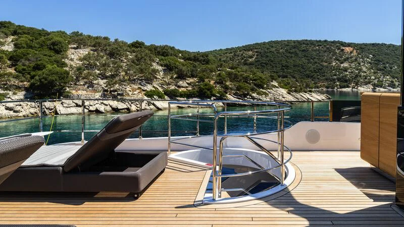 a swimming pool with a view of mountains and blue sky aboard AT ONE Yacht for Charter