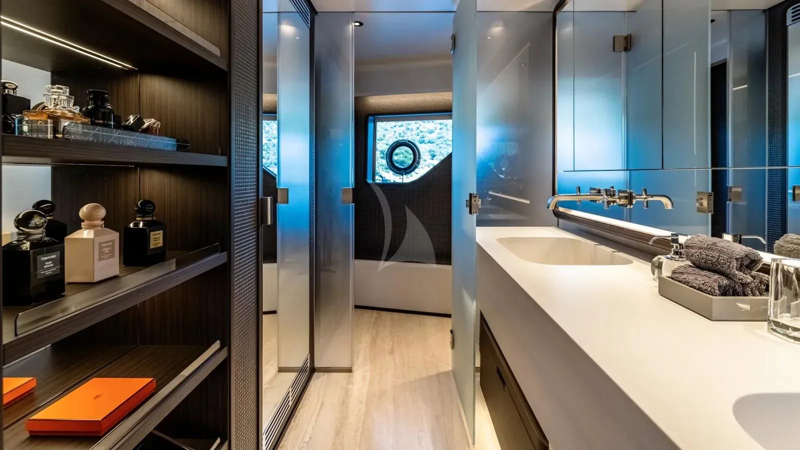 a bathroom with a large mirror aboard AT ONE Yacht for Charter