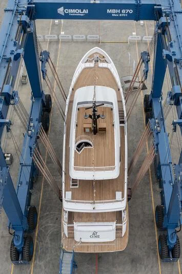 a large white and gold rocket aboard AT ONE Yacht for Charter
