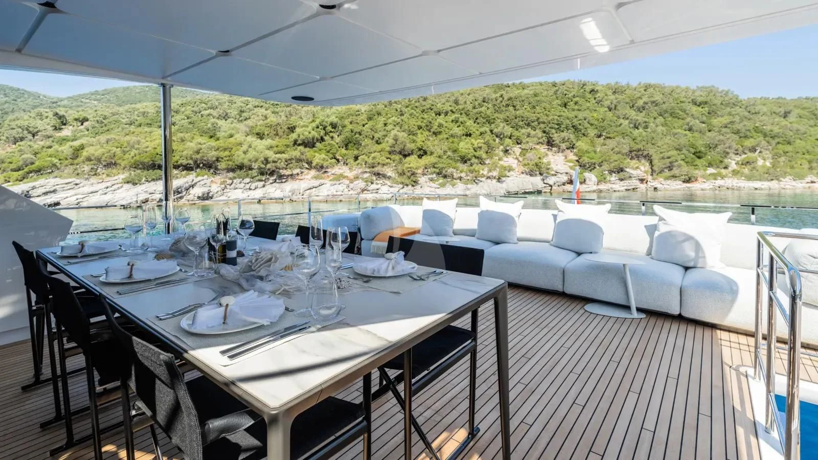 a table set for a meal aboard AT ONE Yacht for Charter