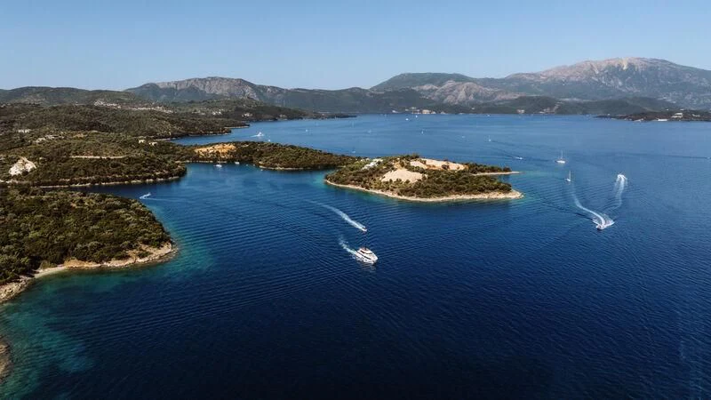 a body of water with land in the background aboard AT ONE Yacht for Charter
