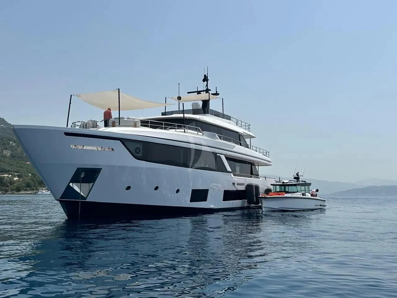 a couple of boats on the water aboard AT ONE Yacht for Charter