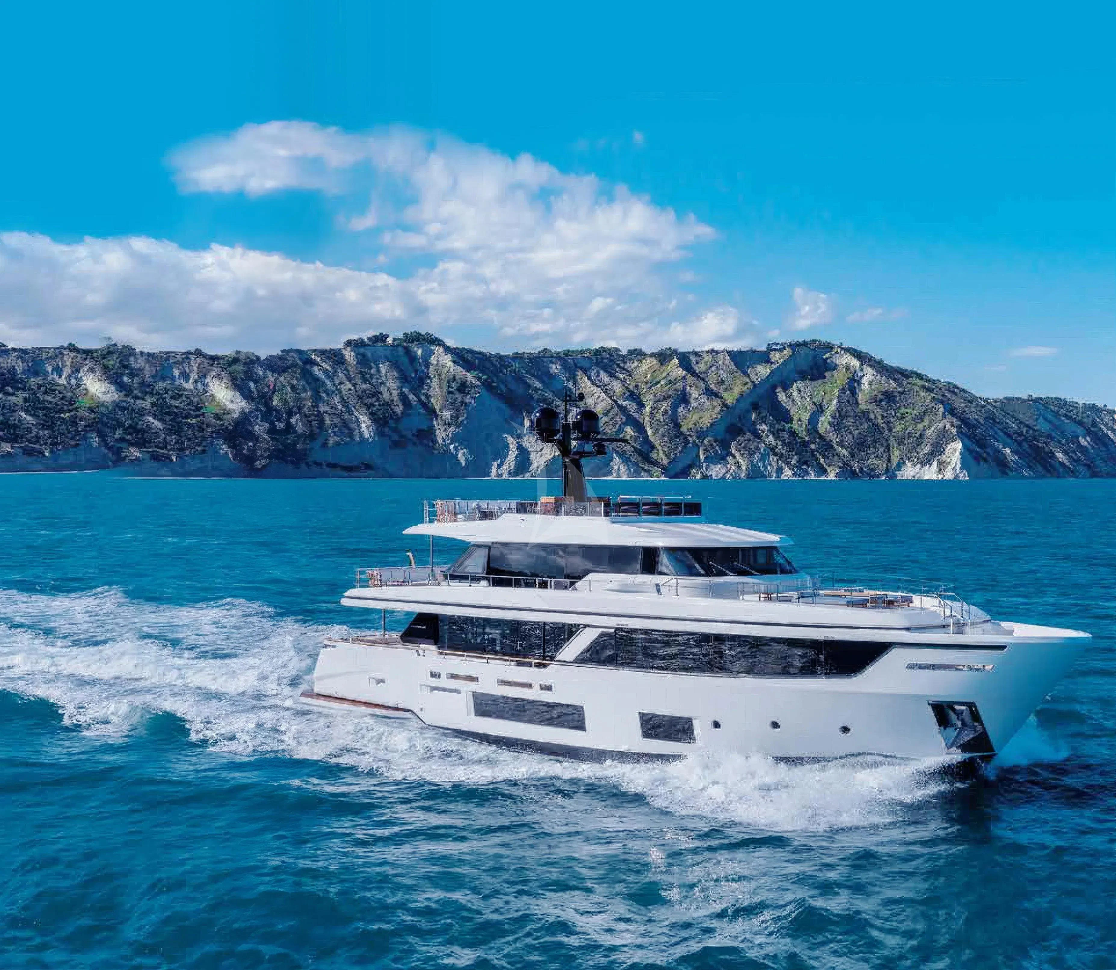 a person standing on a boat in the water aboard AT ONE Yacht for Charter