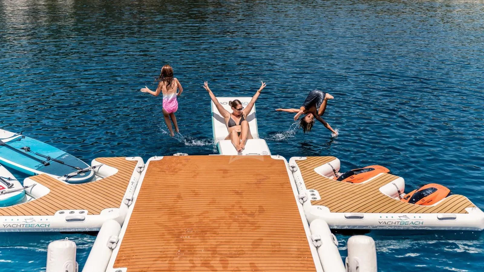 a group of people on a boat aboard AT ONE Yacht for Charter