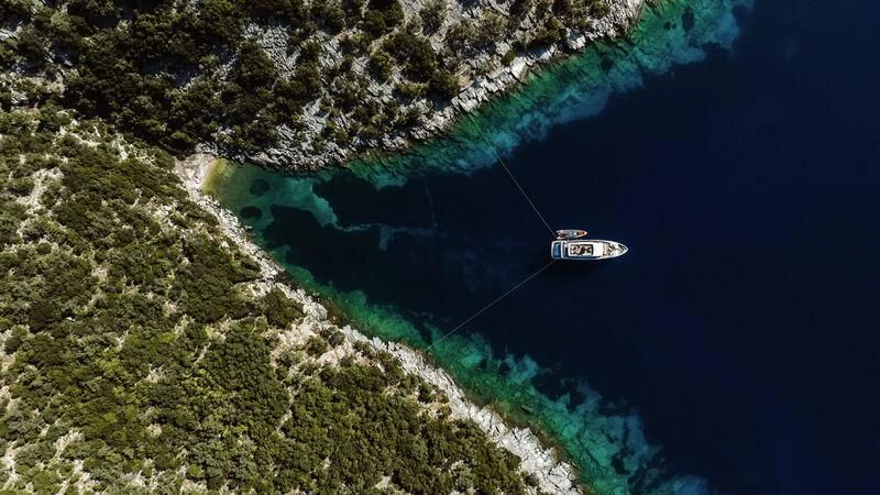 a boat in the water aboard AT ONE Yacht for Charter