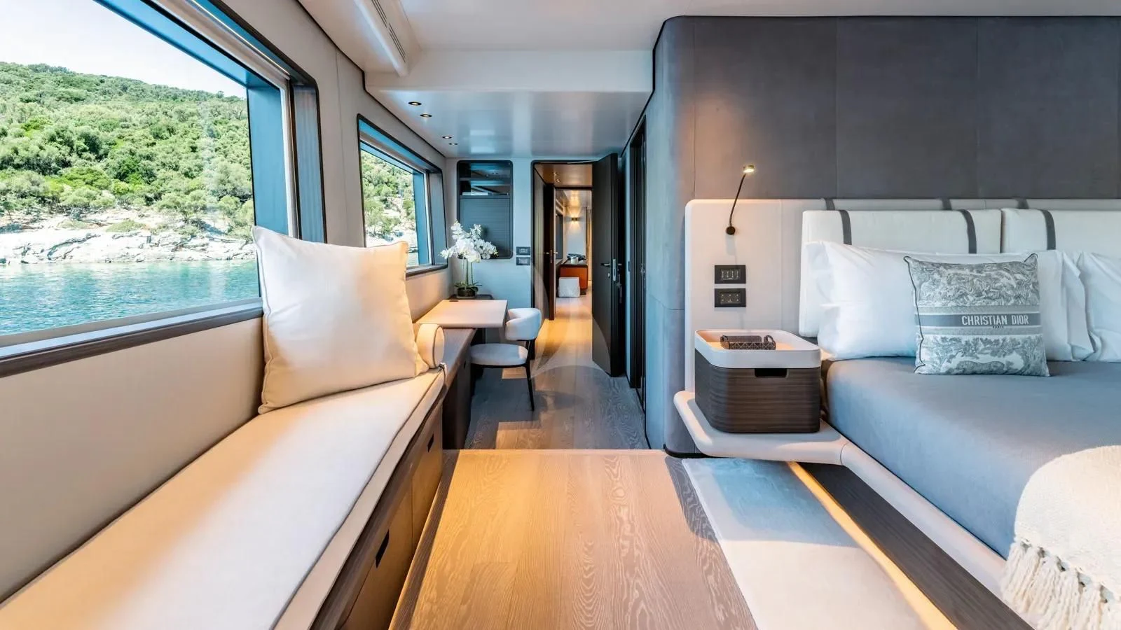 a living room with a couch and a table aboard AT ONE Yacht for Charter