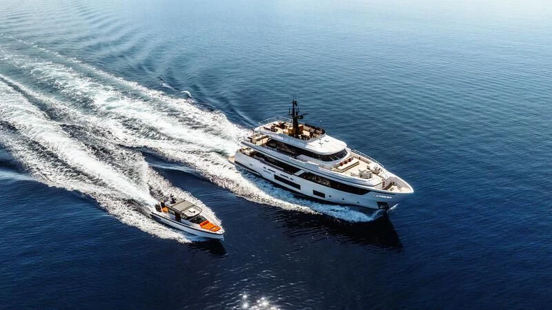 a couple of boats in the ocean aboard AT ONE Yacht for Charter