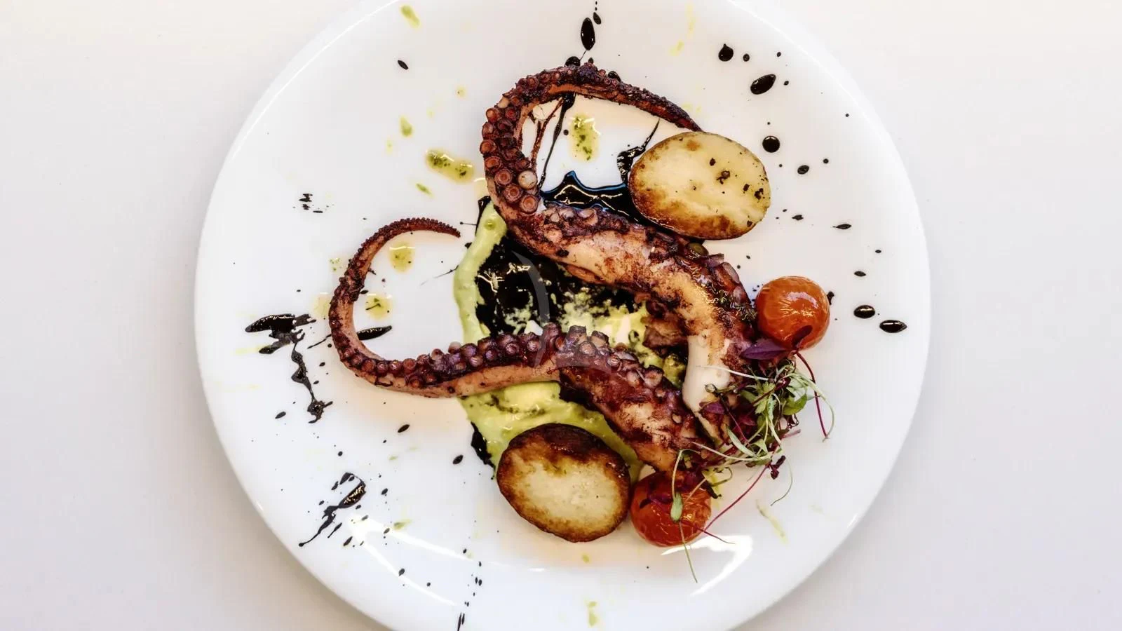 a plate of food aboard AT ONE Yacht for Charter