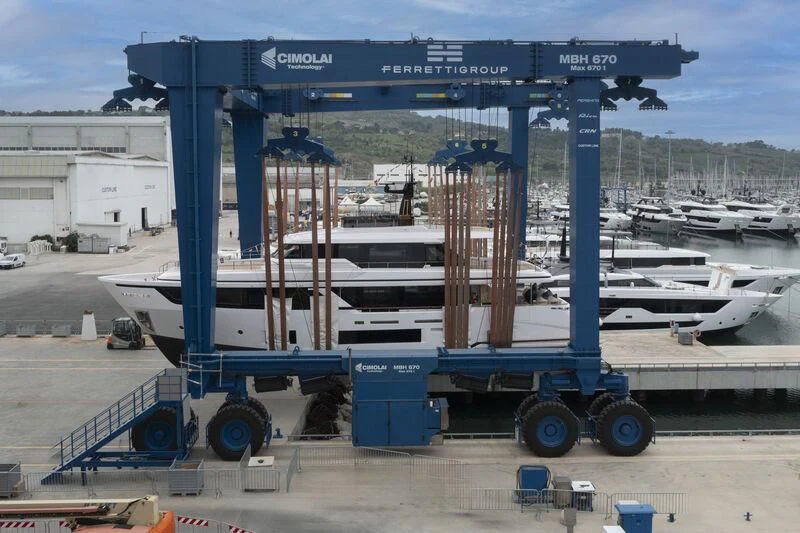 a large machine next to a plane aboard AT ONE Yacht for Charter