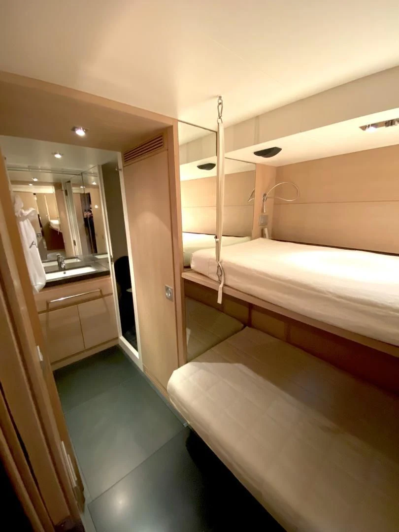 a bathroom with a tub and sink aboard ASH Yacht for Sale