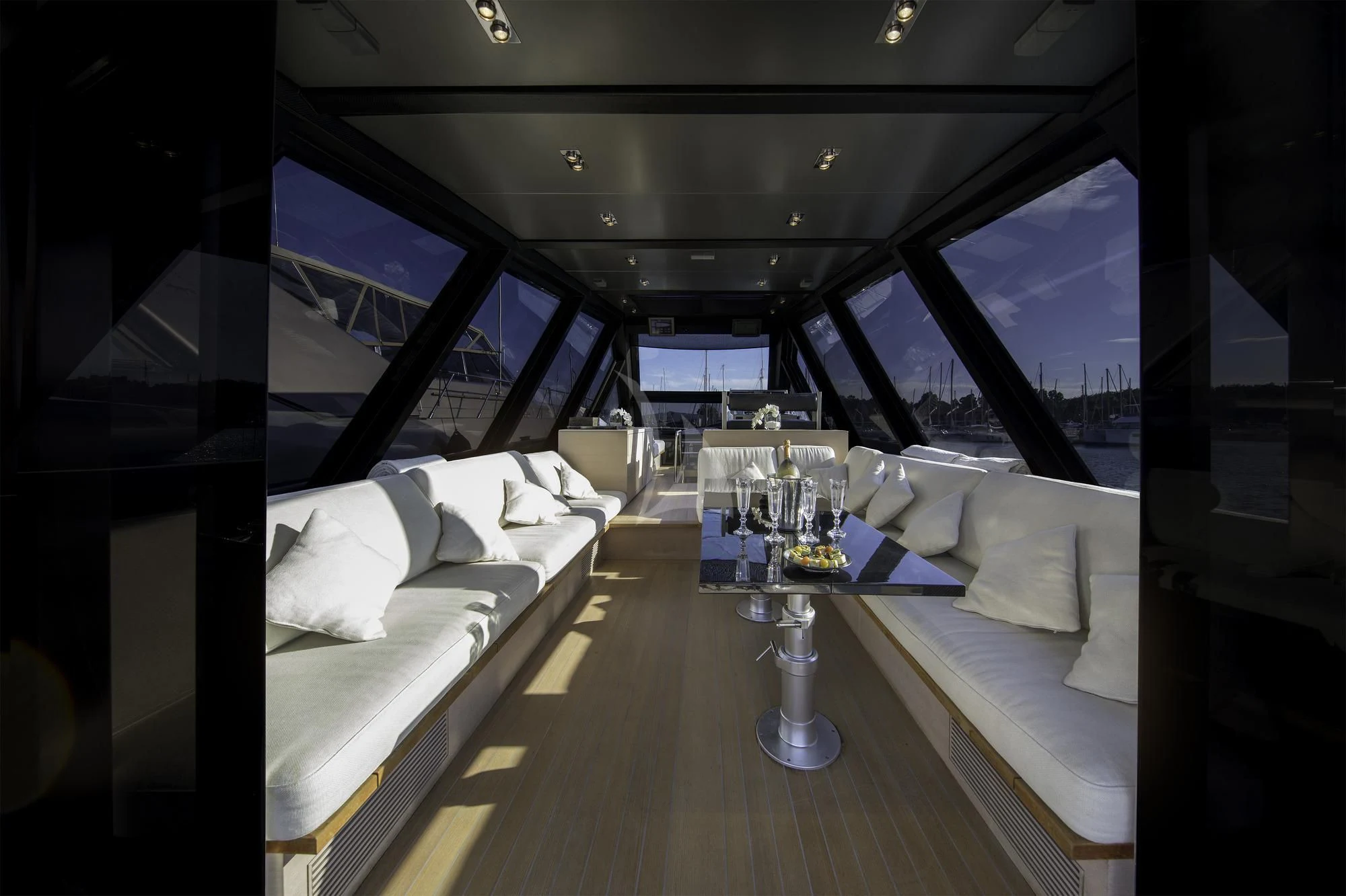 a room with a table and a bed aboard ASH Yacht for Sale