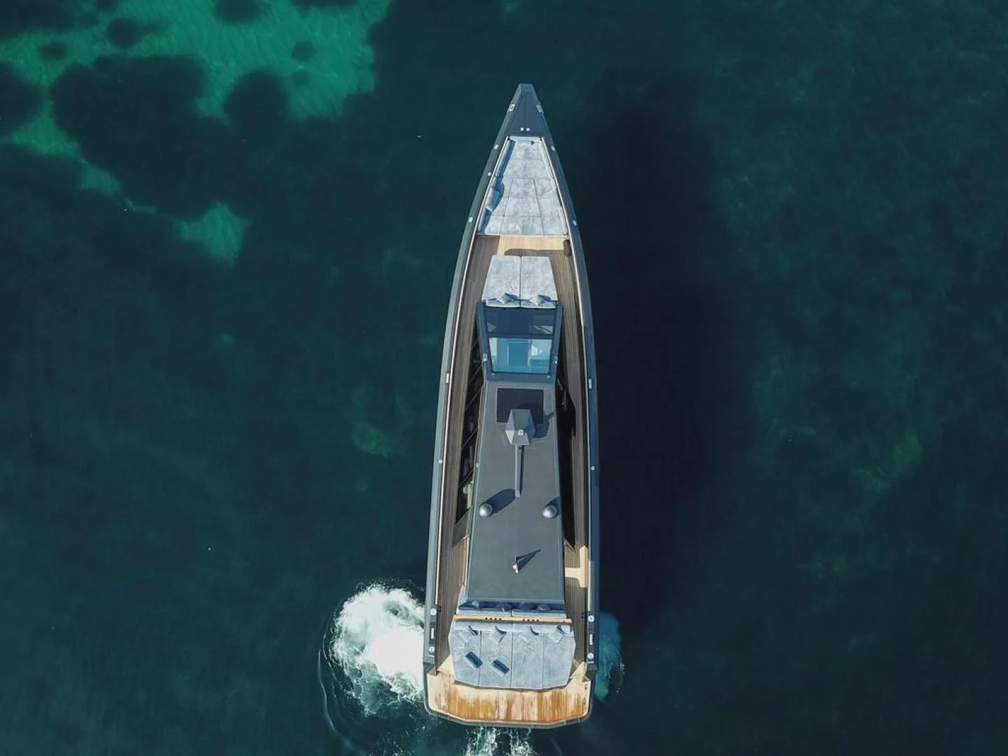 a rocket floating in the water aboard ASH Yacht for Sale