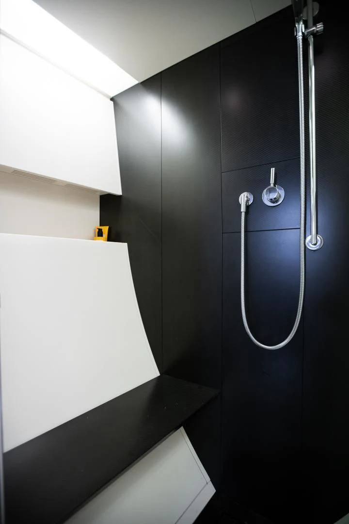 a bathroom with a shower unit aboard ASH Yacht for Sale