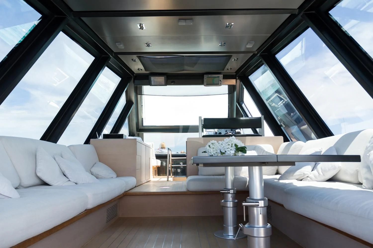 a living room with a large window aboard ASH Yacht for Sale