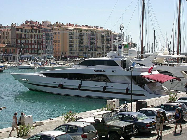 a boat docked at a pier aboard RED SAPPHIRE I Yacht for Sale