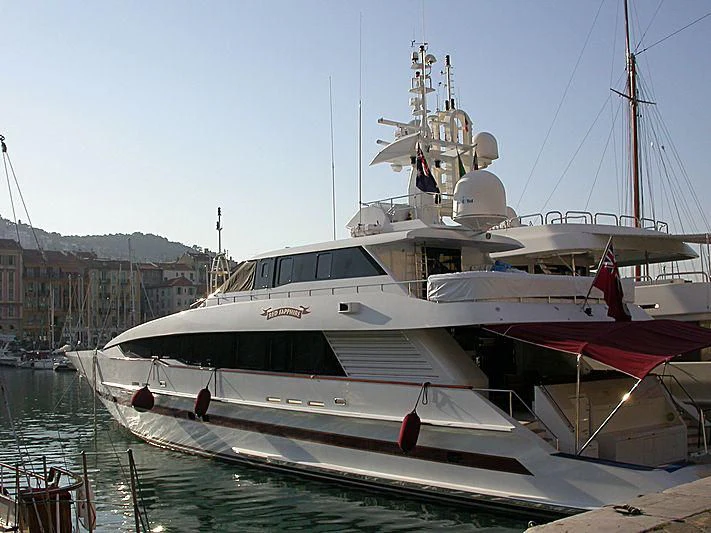 a boat docked in a harbor aboard RED SAPPHIRE I Yacht for Sale