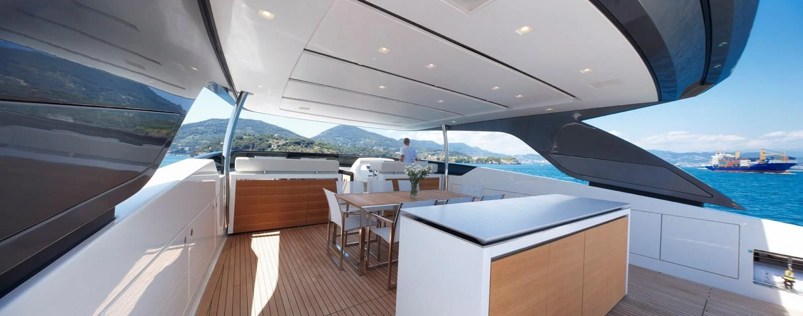a room with a table and chairs aboard INDIGO Yacht for Sale