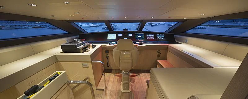 a room with a desk and computer aboard INDIGO Yacht for Sale