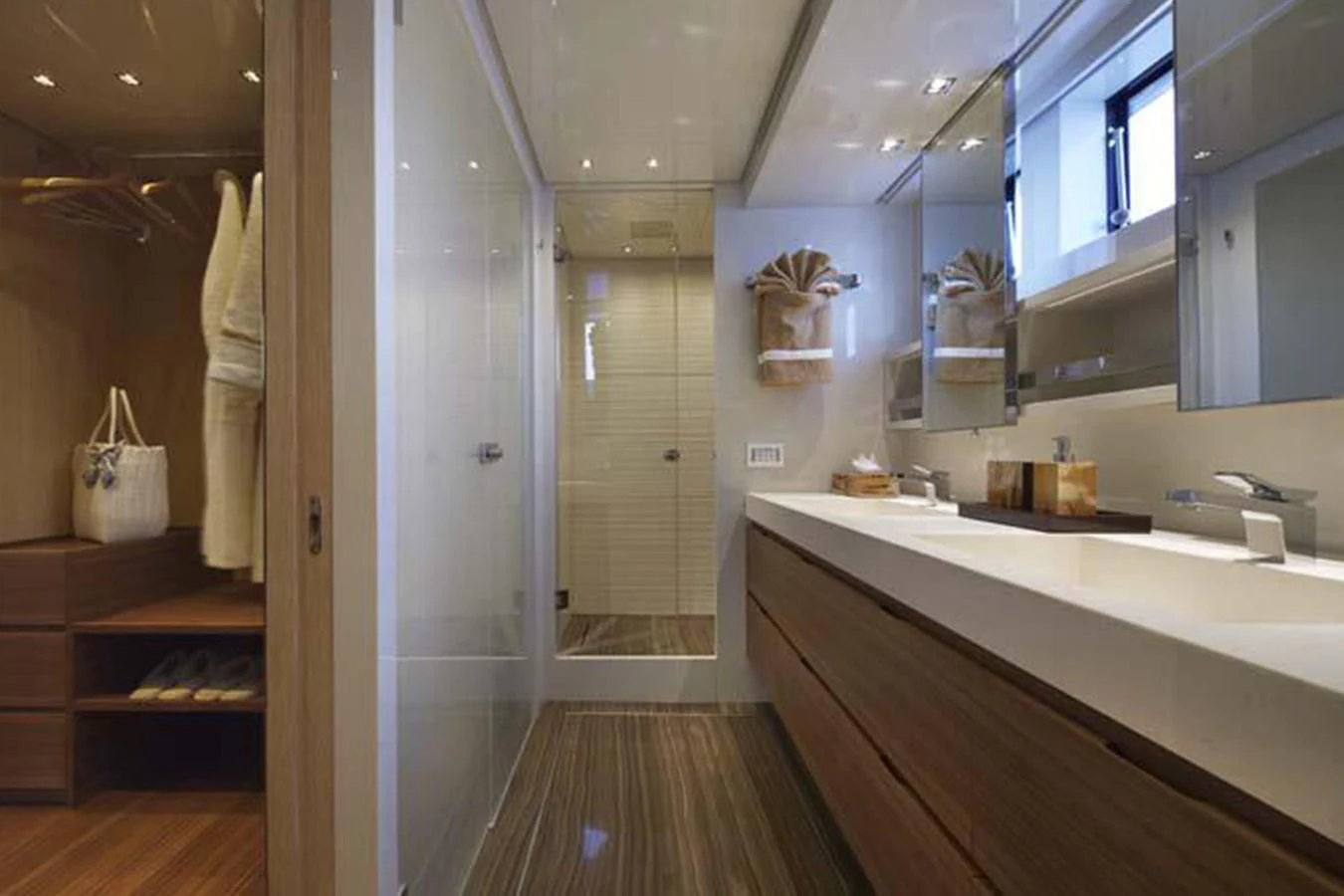 a bathroom with a sink and a mirror aboard INDIGO Yacht for Sale