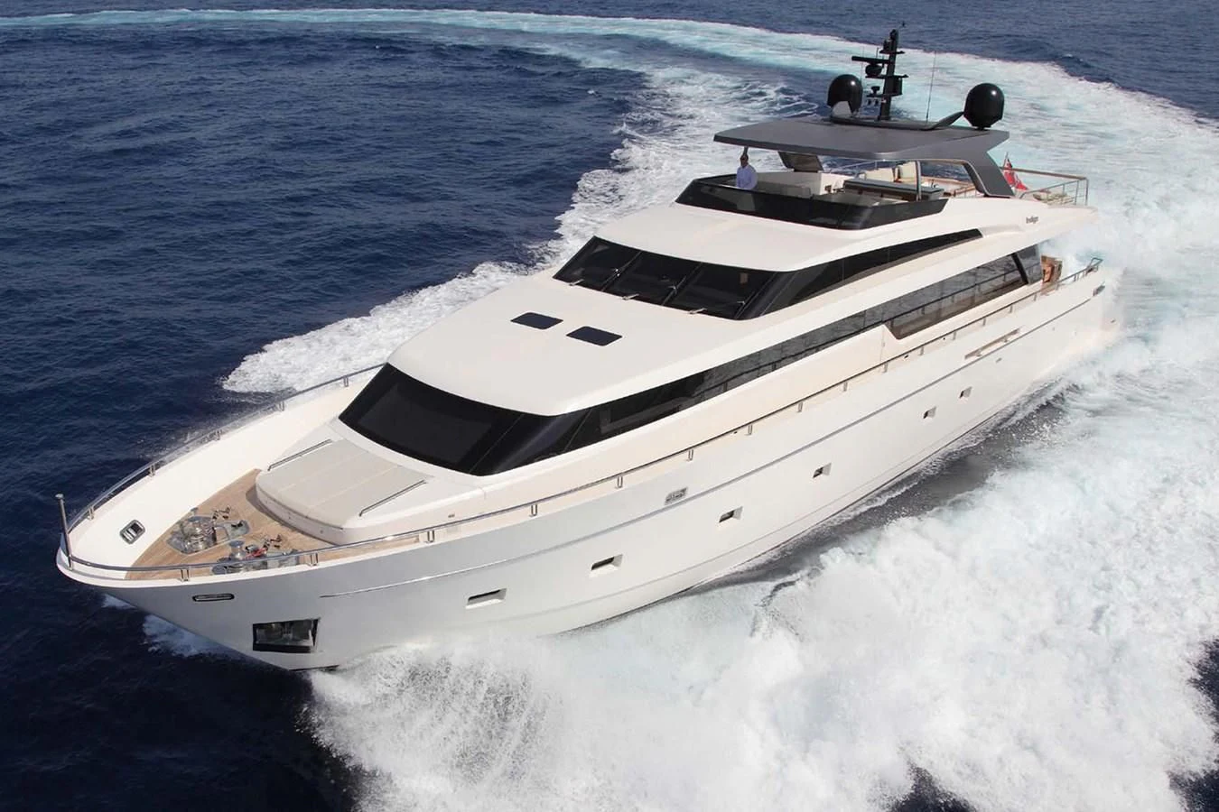 a white yacht on the water aboard INDIGO Yacht for Sale