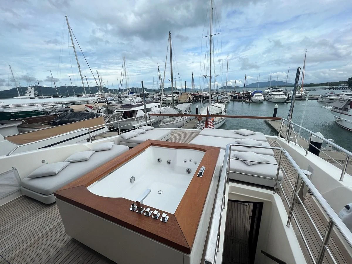 a boat in a harbor aboard INDIGO Yacht for Sale