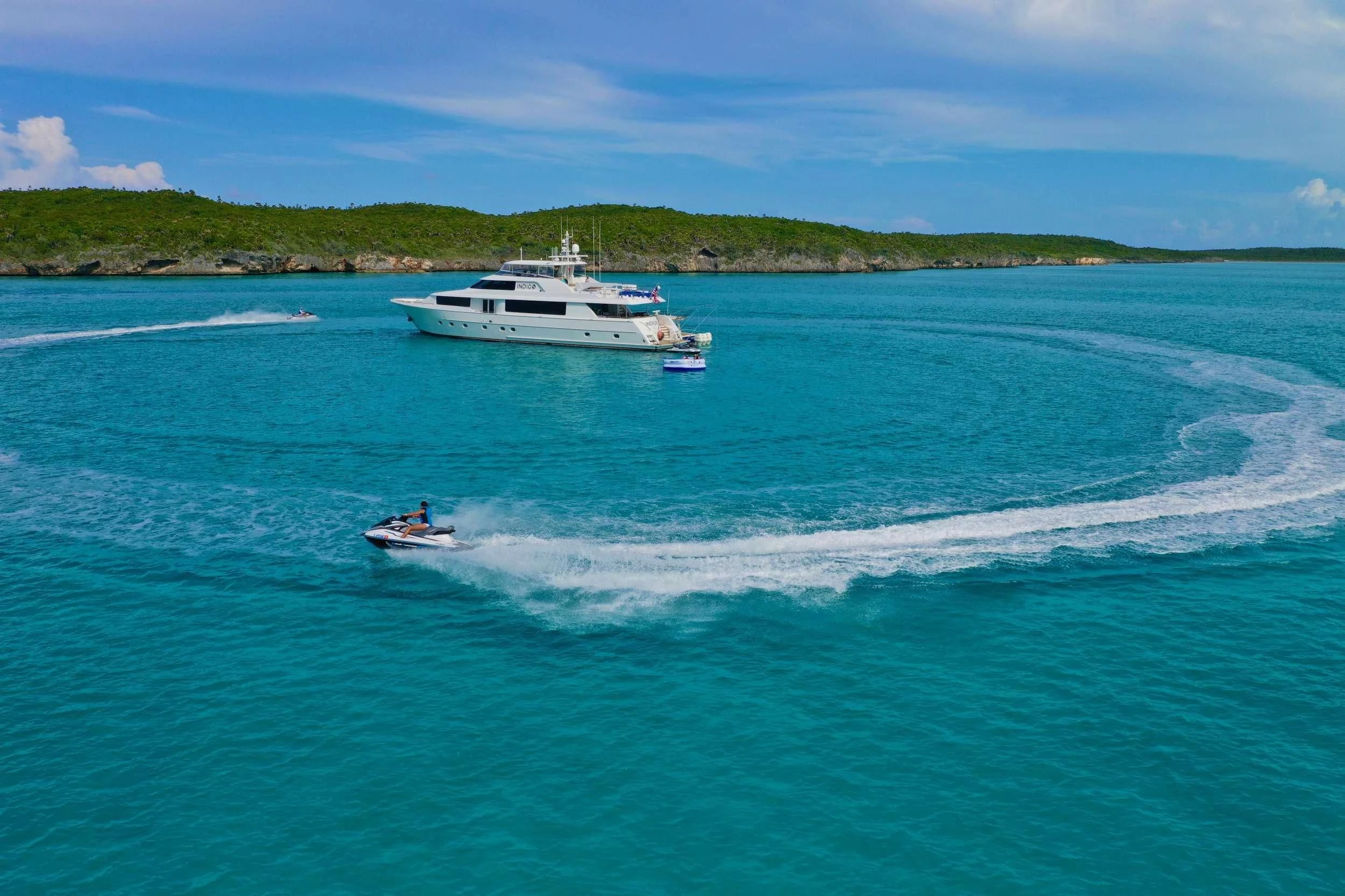 a boat sailing on the sea aboard INDIGO Yacht for Sale